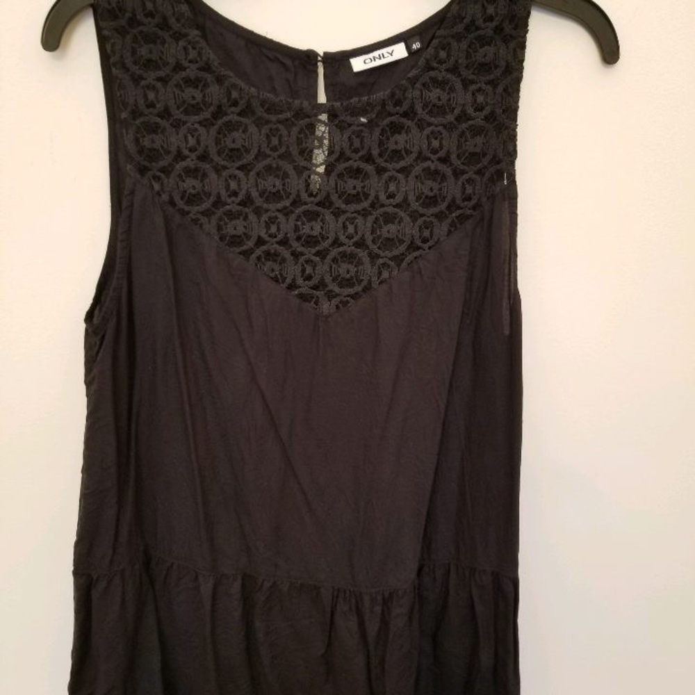 Very cute lace front frill bottom sleeveless top